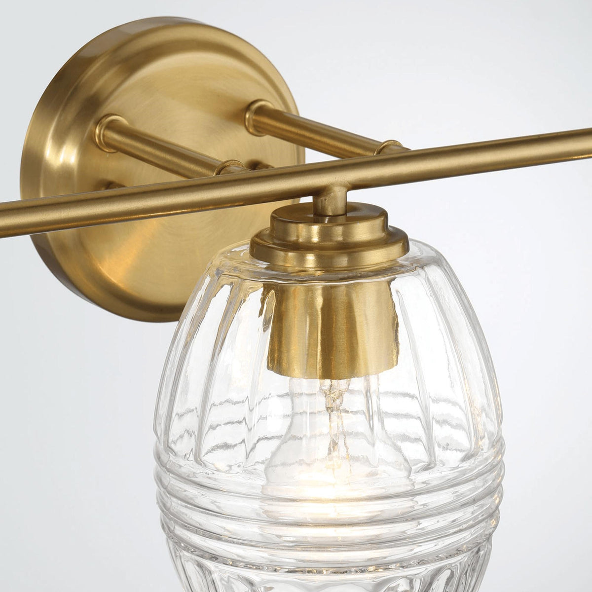 Luxurious Three-Light Vanity Wall Lamp with Clear Glass, Satin Brass Finish, Perfect for Bathroom Decor, 7.5" L x 22" W x 8.5" H, Clear+Gold