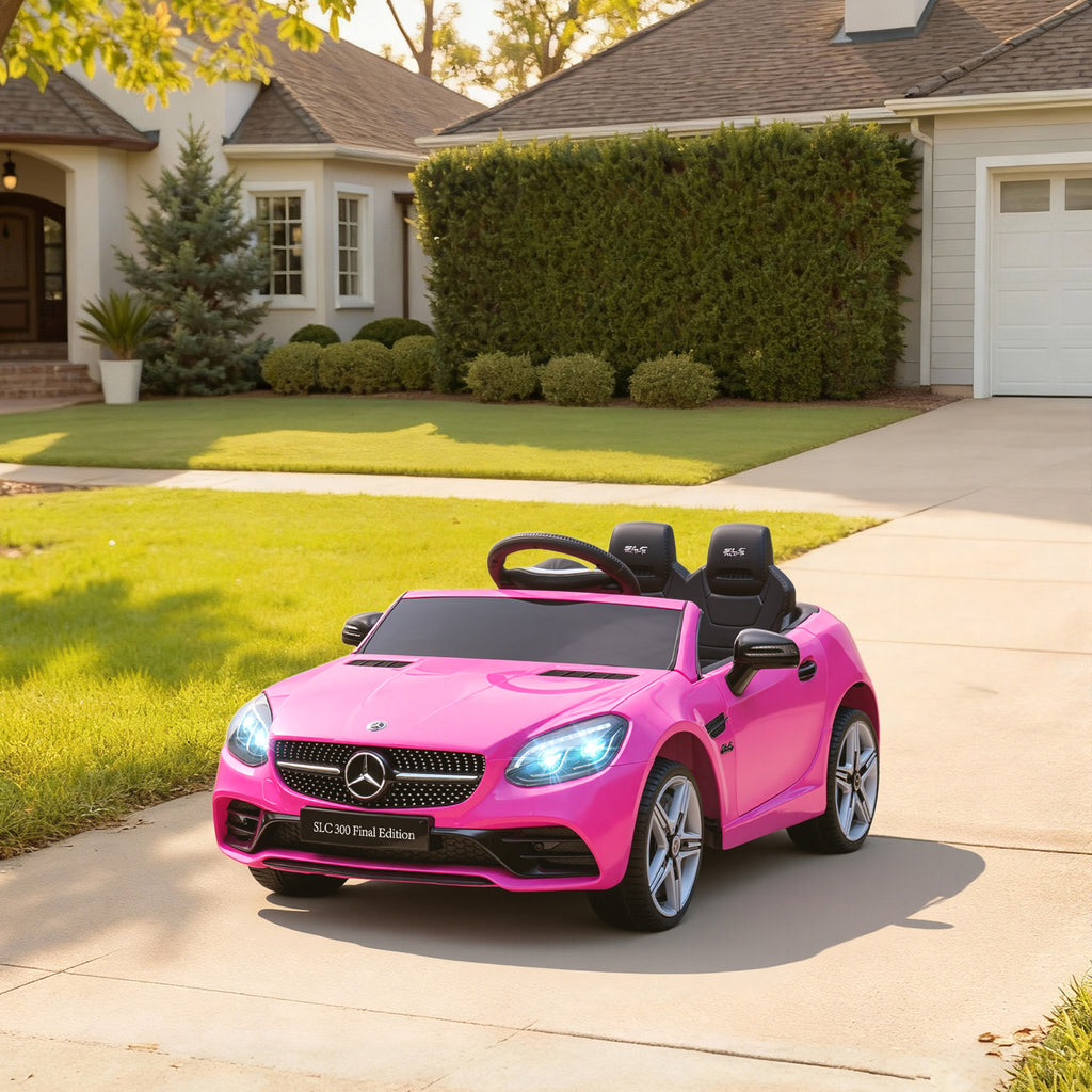 SLC 300 Licensed 12V Ride On Car for Kids with Remote Control, 2 Speeds, Battery Powered Kids Electric Car with Music, Lights, Suspension for 3-6 Years Old, Pink