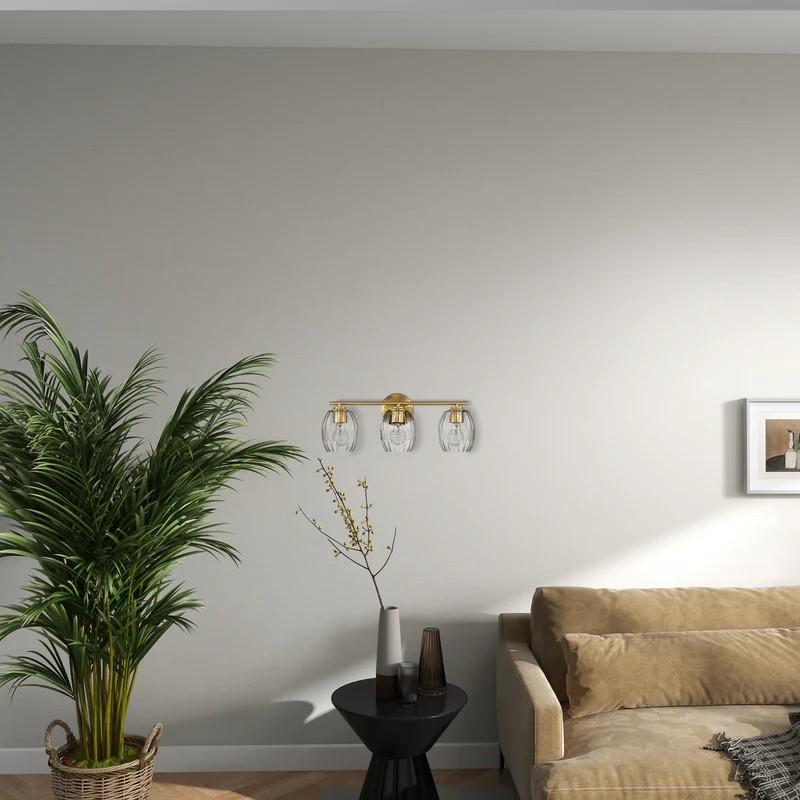 Luxurious Three-Light Vanity Wall Lamp with Clear Glass, Satin Brass Finish, Perfect for Bathroom Decor, 7.5" L x 22" W x 8.5" H, Clear+Gold