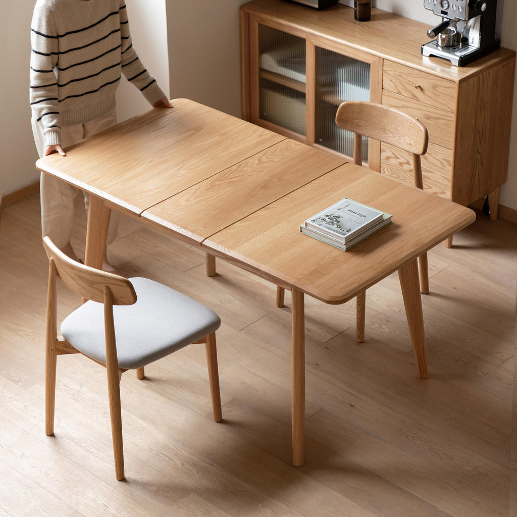 Extendable Dining Table with Diagonal Legs & Rounded Corners, Versatile Kitchen Table for 6-8 People, 59″ L x 31.5″ W x 29.5″ H, Light Oak