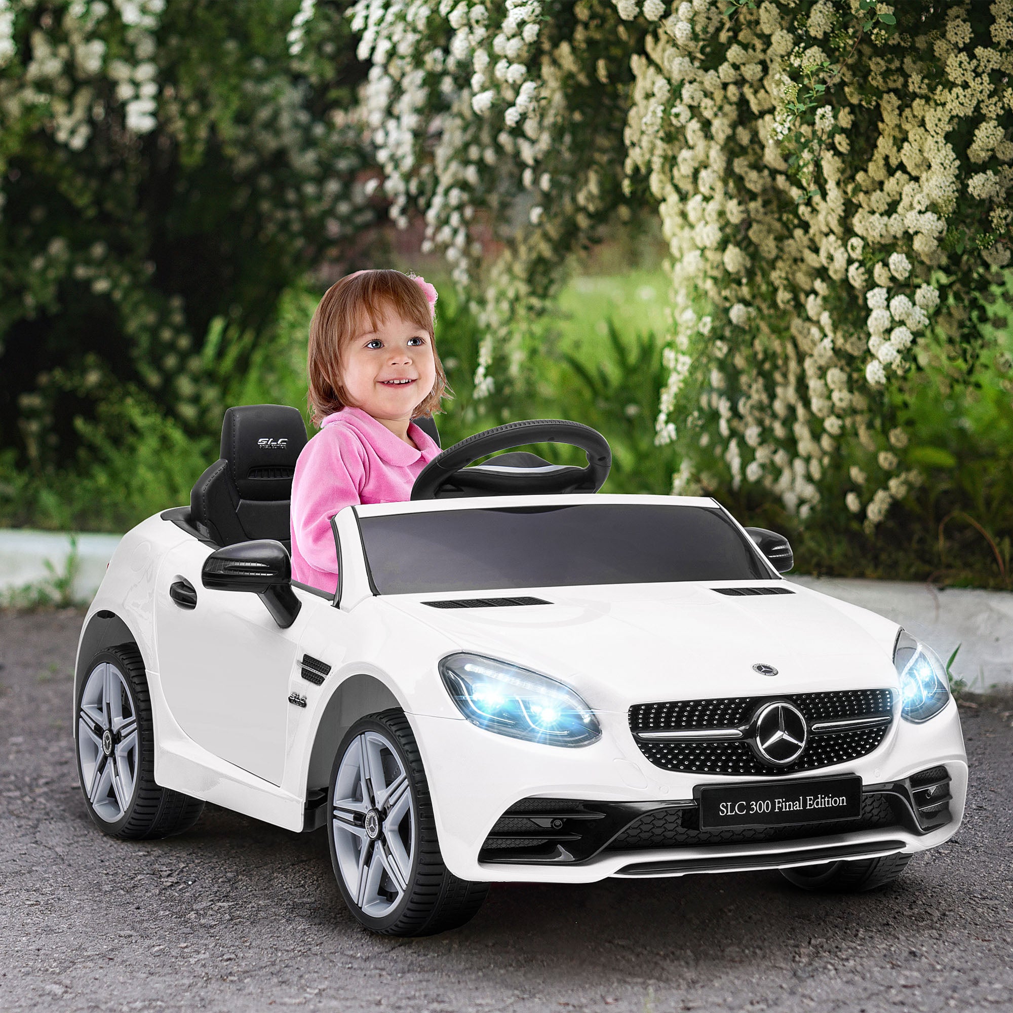 SLC 300 Licensed 12V Ride On Car for Kids with Remote Control, 2 Speeds, Battery Powered Kids Electric Car with Music, Lights, Suspension for 3-6 Years Old, White