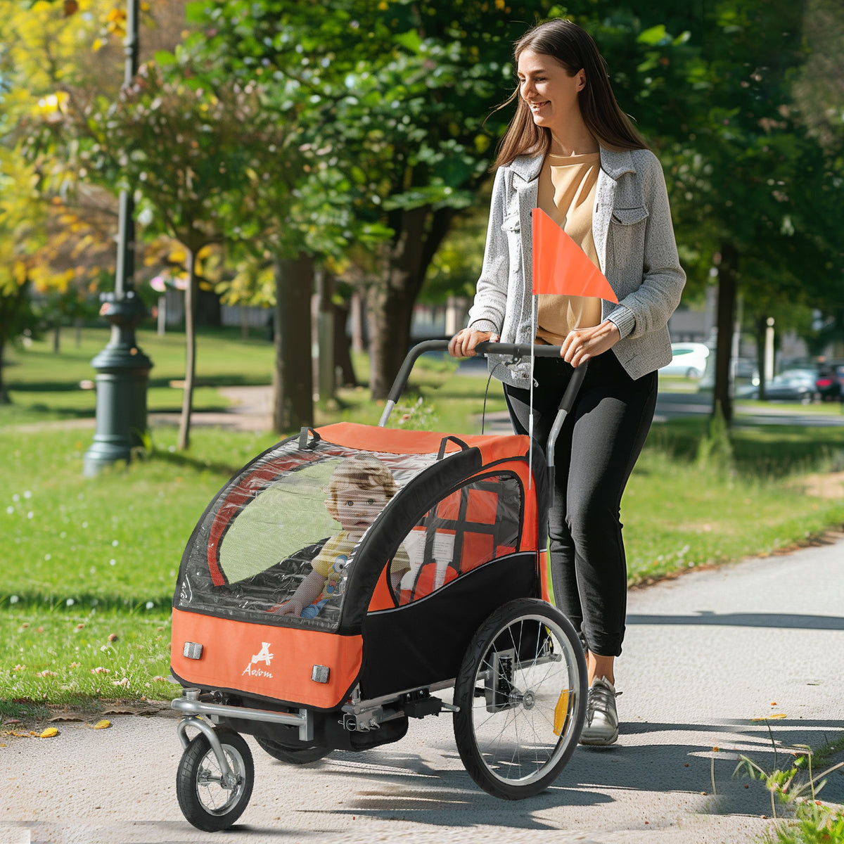 2-Seat Elite 360 Swivel Bike Trailer for Kids Bicycle Cargo Trailer with Water-Resistant Windows, Black and Orange